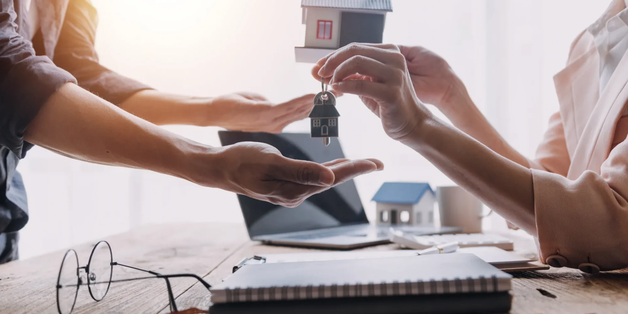home-buyers-meet-negotiate-with-real-estate-agents-about-renting-buying-home-office